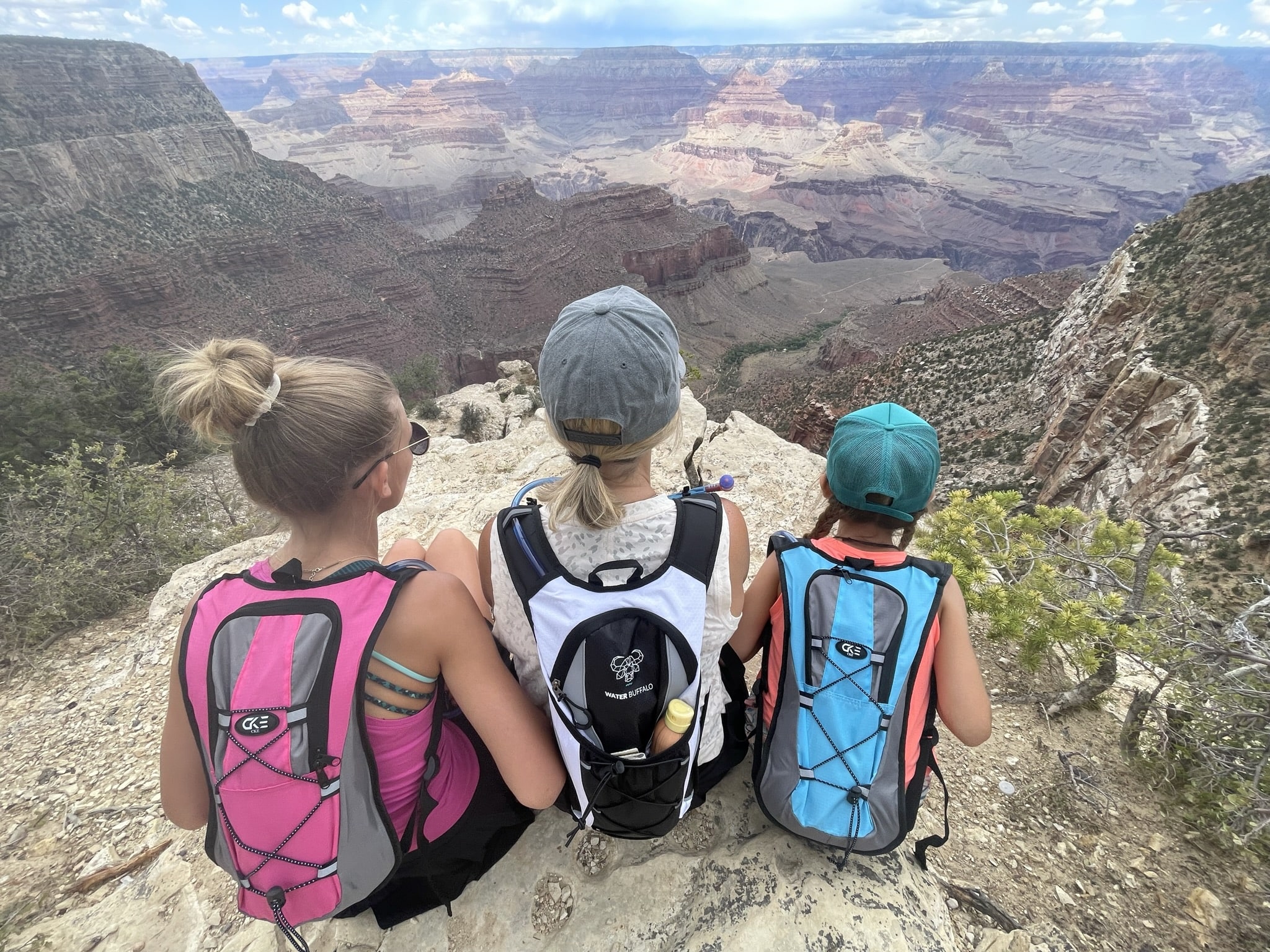 Girls looking out at the Grand Canyon